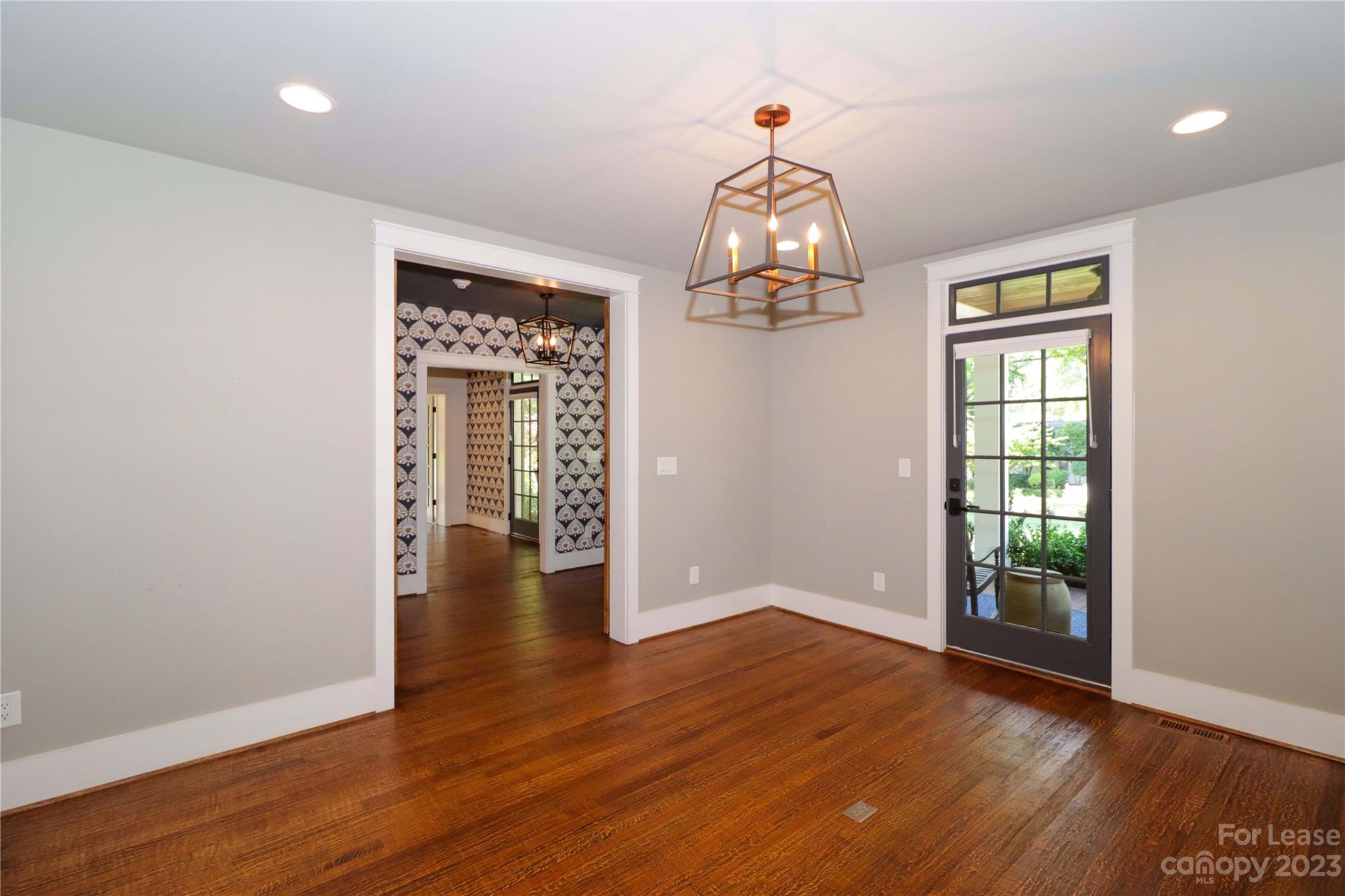517 Lorimer Road Davidson, NC 28036 - Photo 11 of 48 wooden floor in an empty room with a window