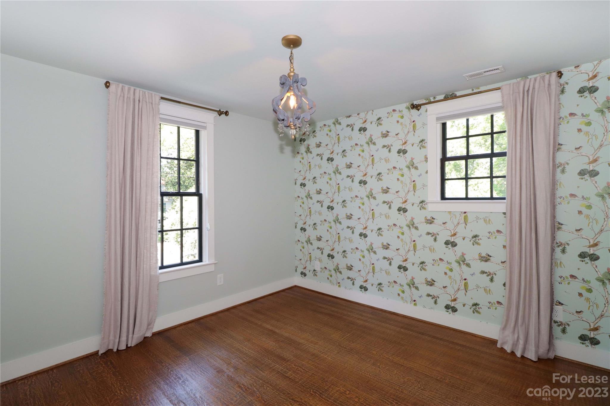 517 Lorimer Road Davidson, NC 28036 - Photo 29 of 48 wooden floor in an empty room with a window