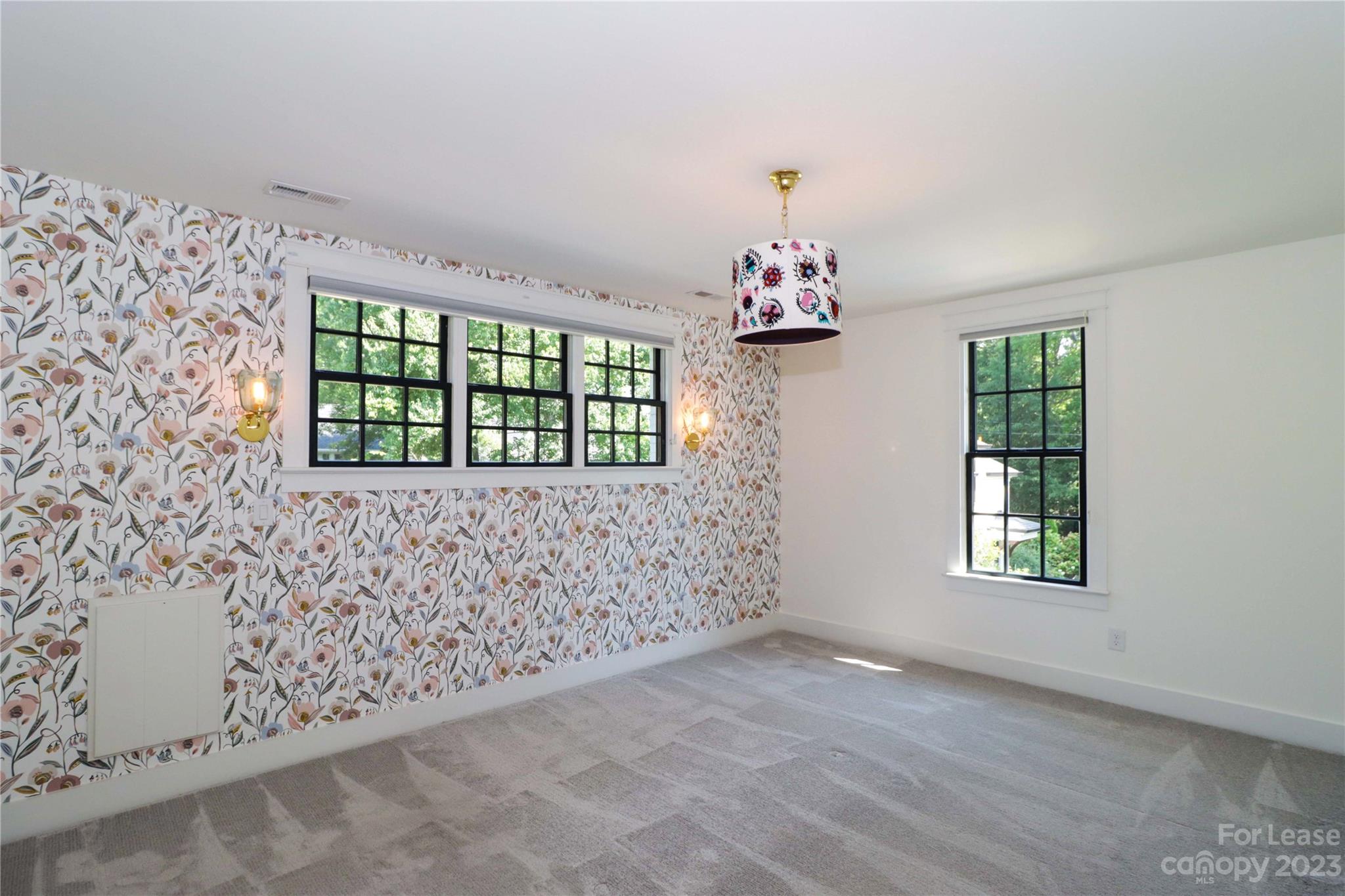 517 Lorimer Road Davidson, NC 28036 - Photo 30 of 48 an empty room with windows