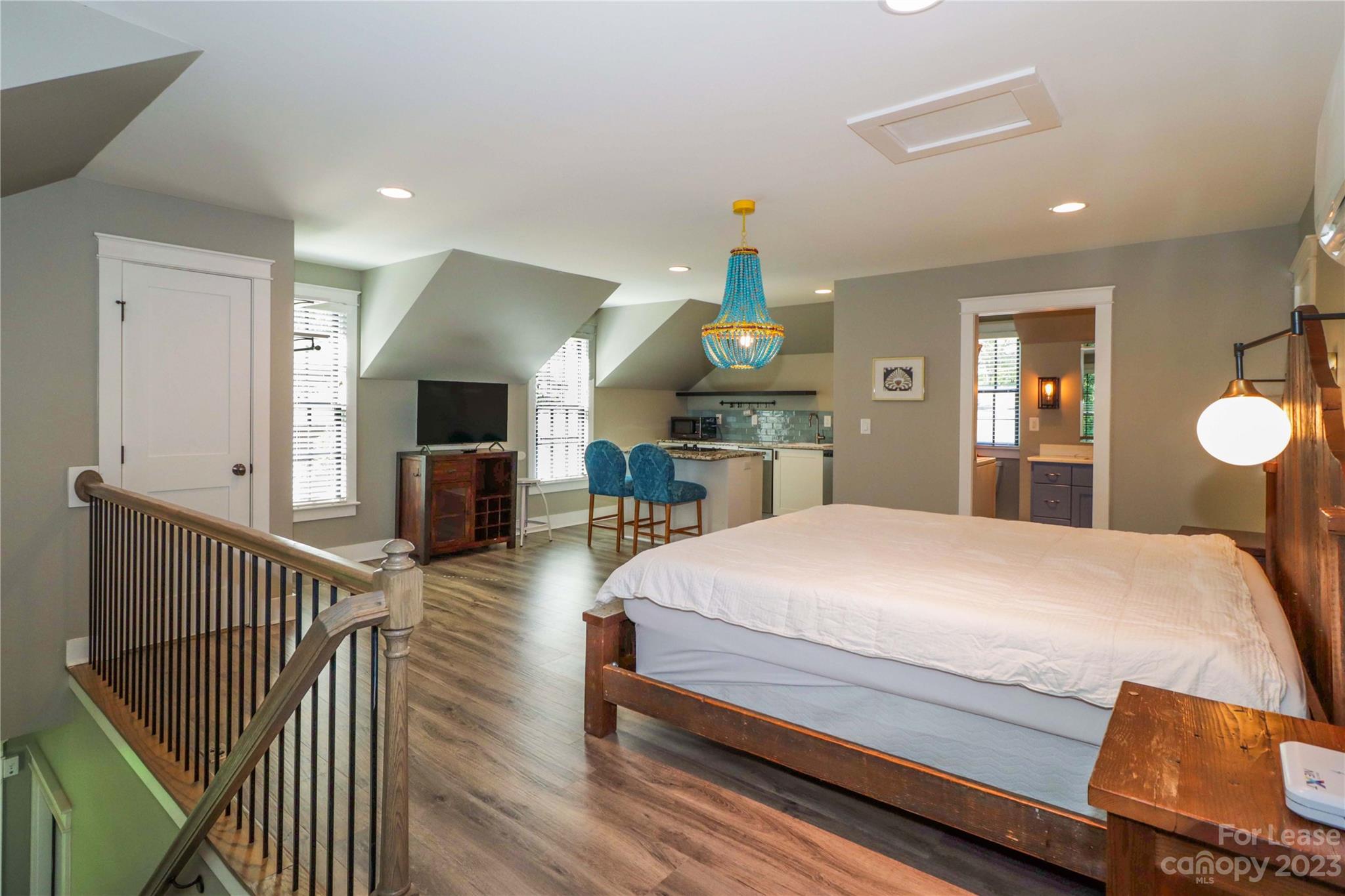 517 Lorimer Road Davidson, NC 28036 - Photo 36 of 48 a bed room with a bed and dresser