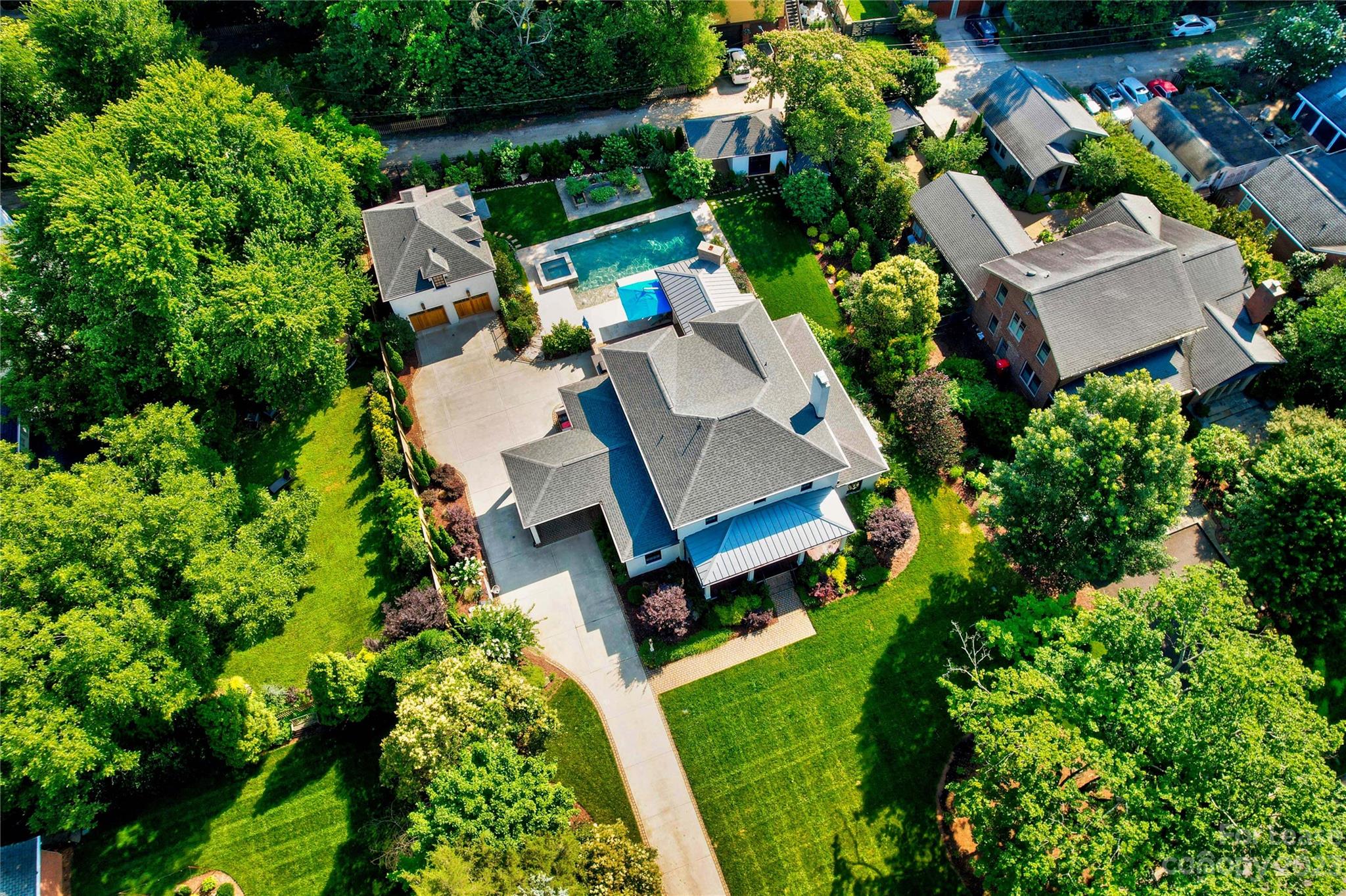 517 Lorimer Road Davidson, NC 28036 - Photo 45 of 48 an aerial view of a house with garden space and street view