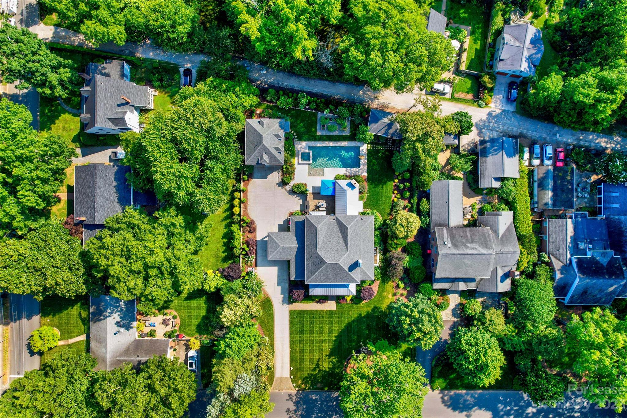 517 Lorimer Road Davidson, NC 28036 - Photo 46 of 48 an aerial view of a house with a garden
