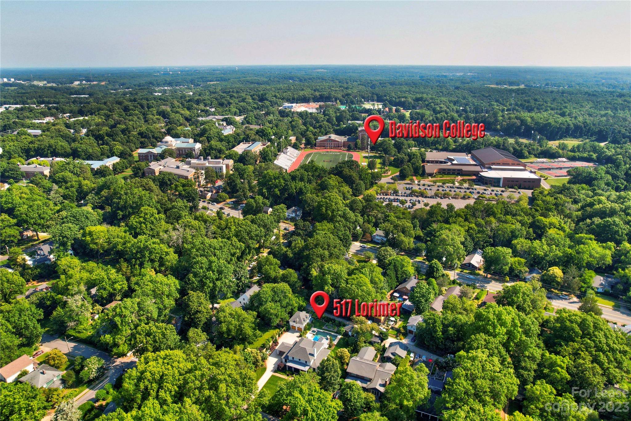 517 Lorimer Road Davidson, NC 28036 - Photo 47 of 48 an aerial view of residential house with outdoor space and trees