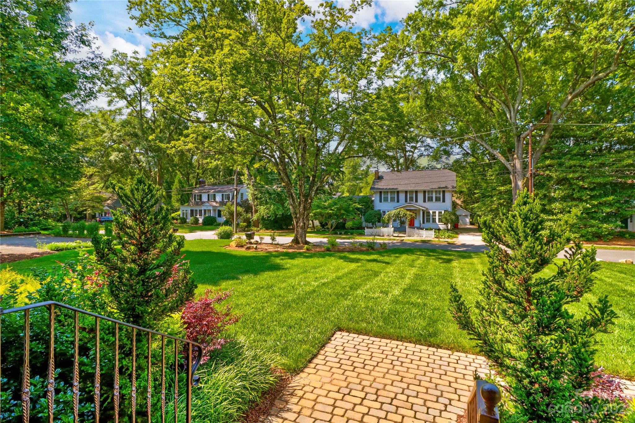 517 Lorimer Road Davidson, NC 28036 - Photo 6 of 48 a view of a house with a backyard