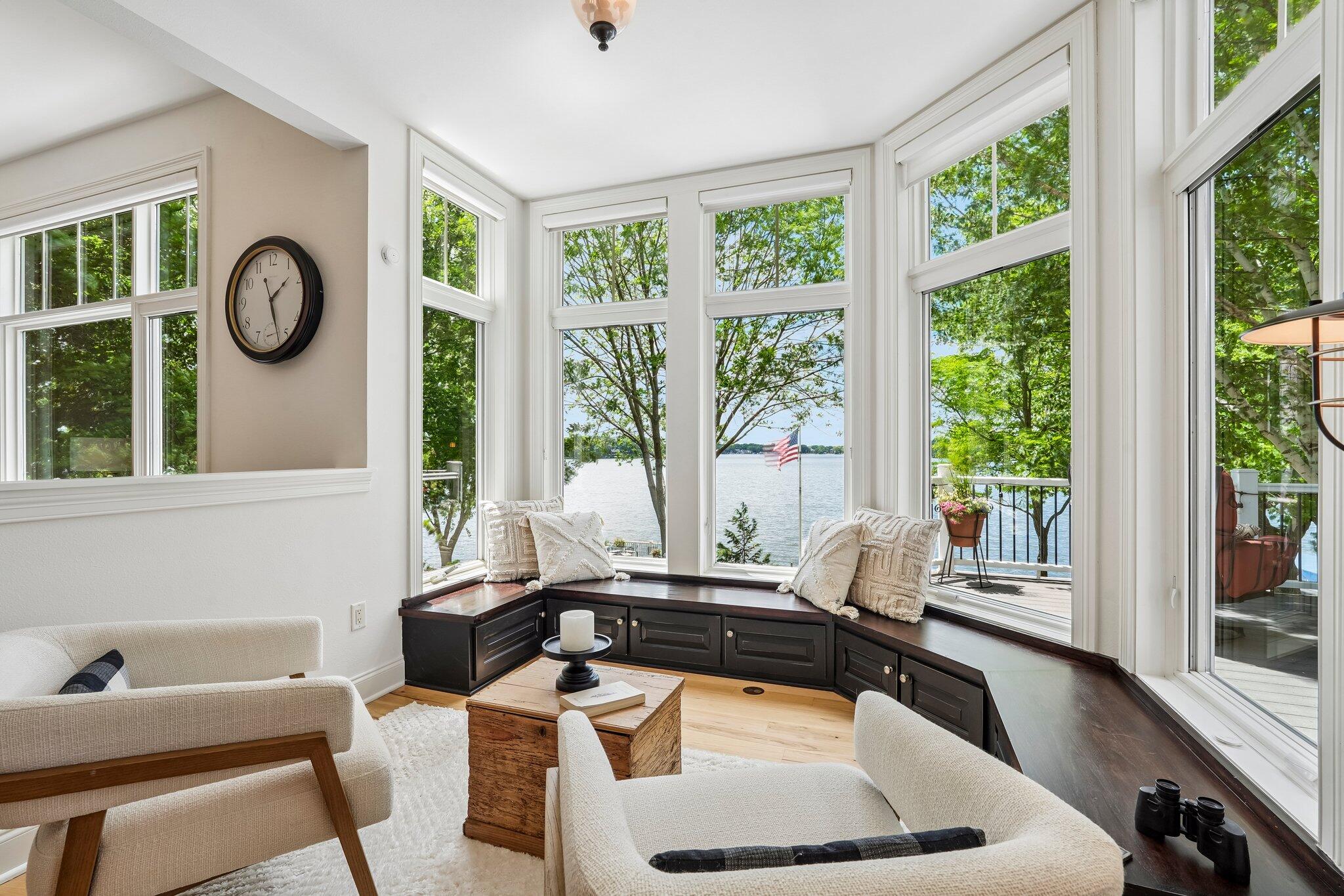 W343N6293 South Bayview Road Oconomowoc, WI 53066 - Photo 29 of 104 Read or relax in the sunroom