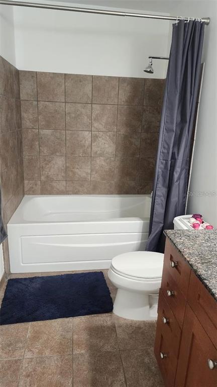 150 East Robinson Street, Unit 4A13 Orlando, FL 32801 - Photo 12 of 30 a bathroom with a toilet and a bathtub