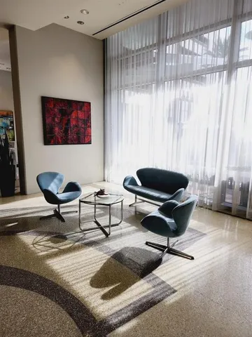 a view of a patio with couches and chairs