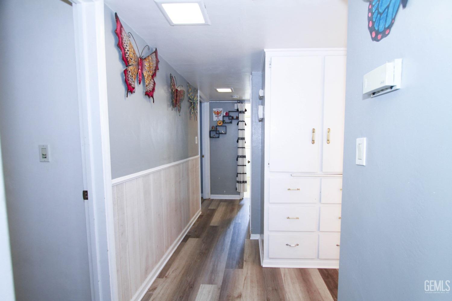 Undisclosed Address Bakersfield, CA 93309 - Photo 12 of 19 a view of a hallway with closet