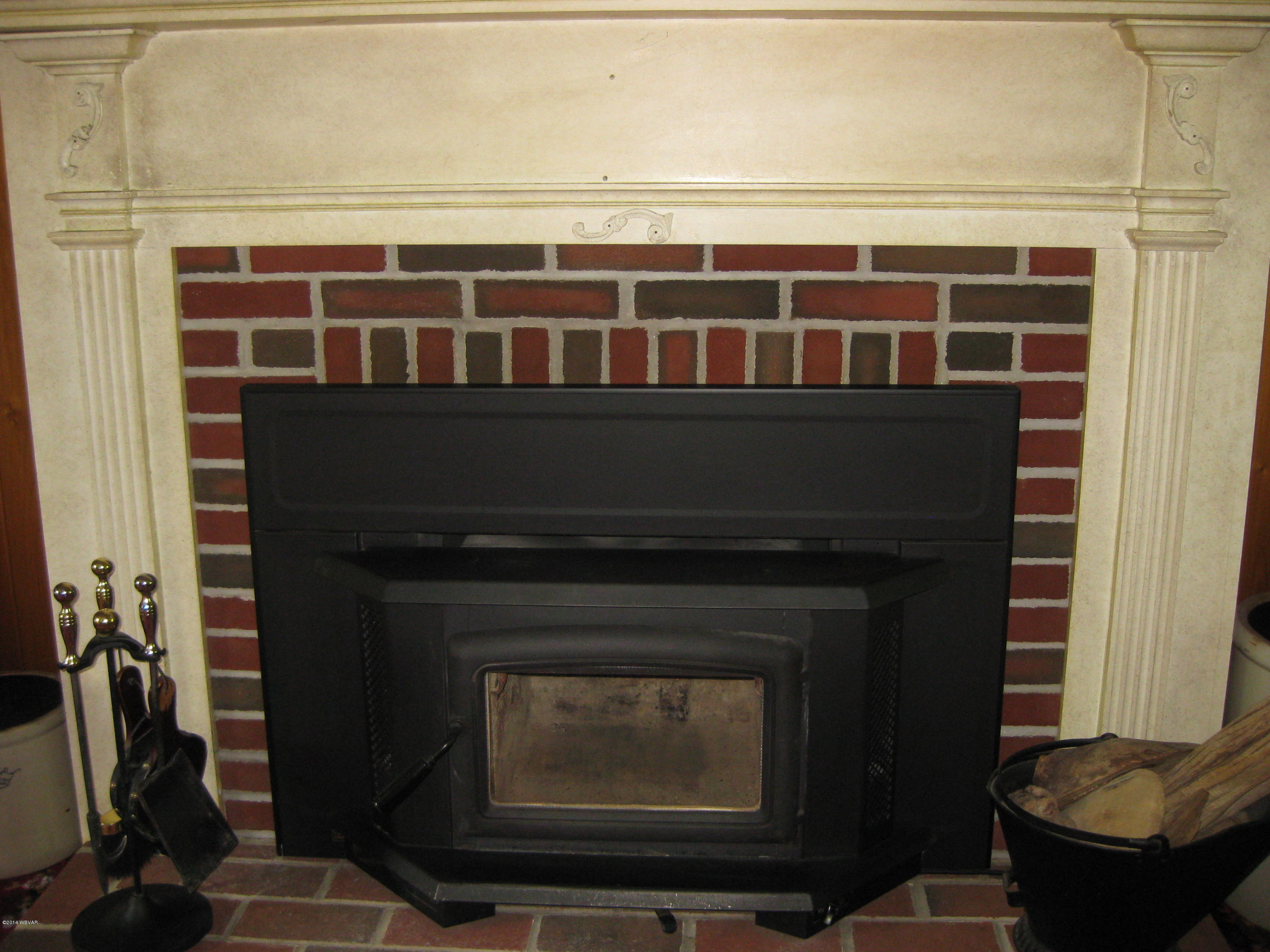 312 Almost Country Road Cogan Station, PA 17728 - Photo 12 of 29 Fireplace with insert