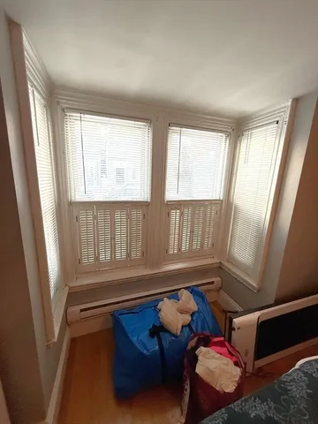 a room with furniture and a window