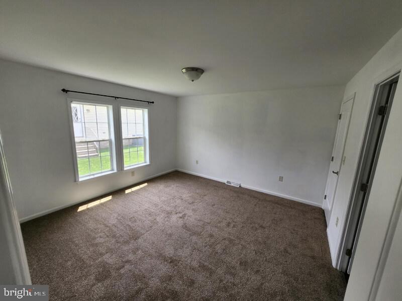 432 Ford Hook Road Doylestown, PA 18901 - Photo 6 of 9 an empty room with windows