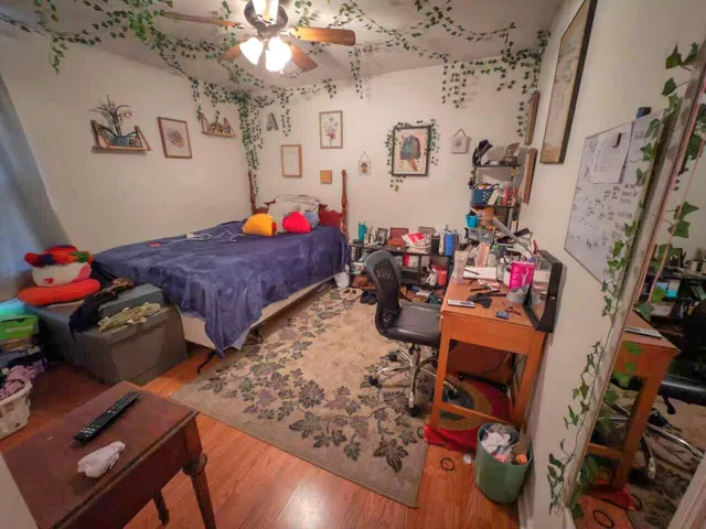 a bed room with a bed and a couch