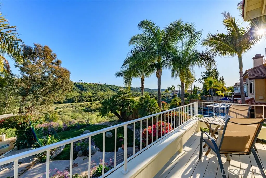 7675 Salix Place San Diego, CA 92129 - Photo 14 of 25 a view of a balcony with wooden floor and outdoor space