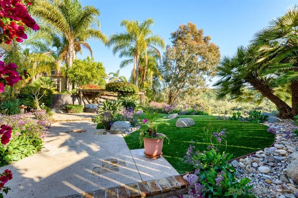 7675 Salix Place San Diego, CA 92129 - Photo 20 of 25 a view of a garden with flowers
