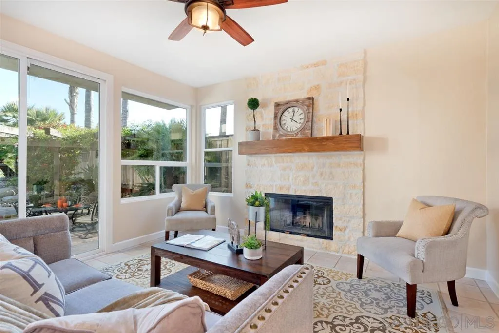 7675 Salix Place San Diego, CA 92129 - Photo 6 of 25 a living room with furniture and a fireplace