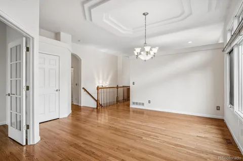 a view of a livingroom with wooden floor