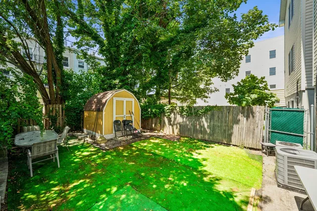 a garden view with a fountain
