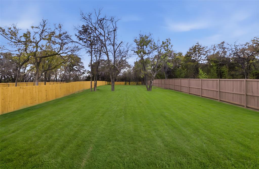 1115 Riverwood Road Dallas, TX 75217 - Photo 30 of 39 View of fenced backyard