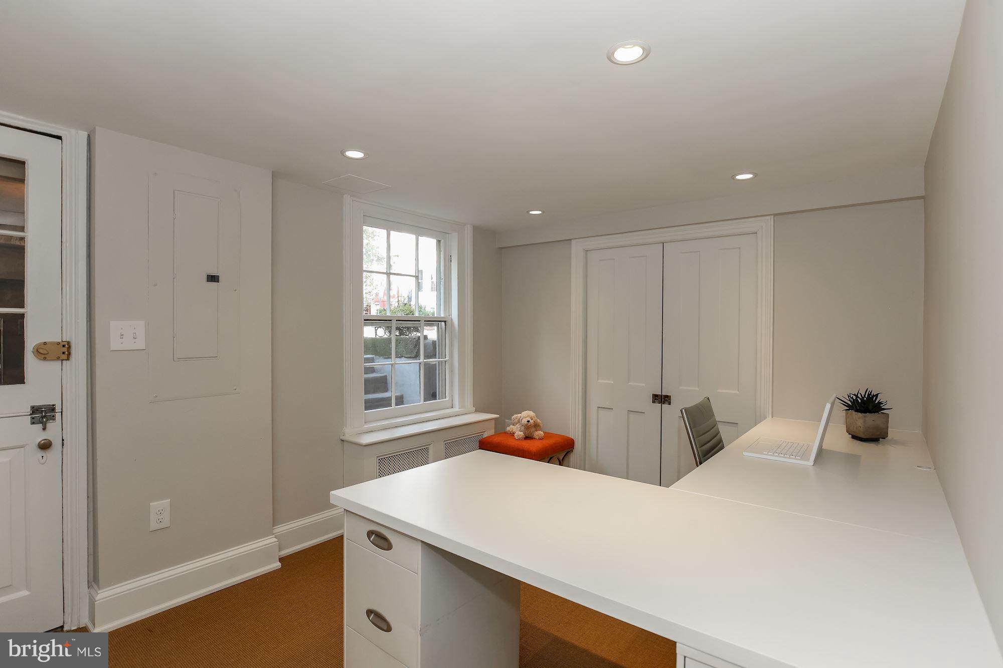 2802 P Street Northwest Washington, DC 20007 - Photo 14 of 17 a bedroom with a bed and a window