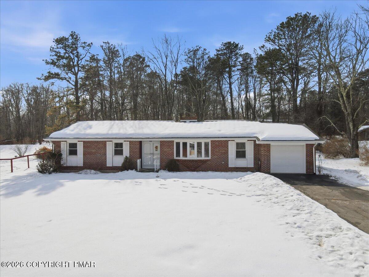 423 T R 620 Cresco, PA 18326 - Photo 1 of 37 a house that has a tree in front of it