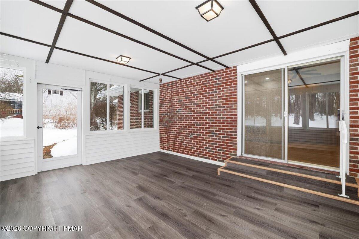 423 T R 620 Cresco, PA 18326 - Photo 13 of 37 a view of a glass door with wooden floor