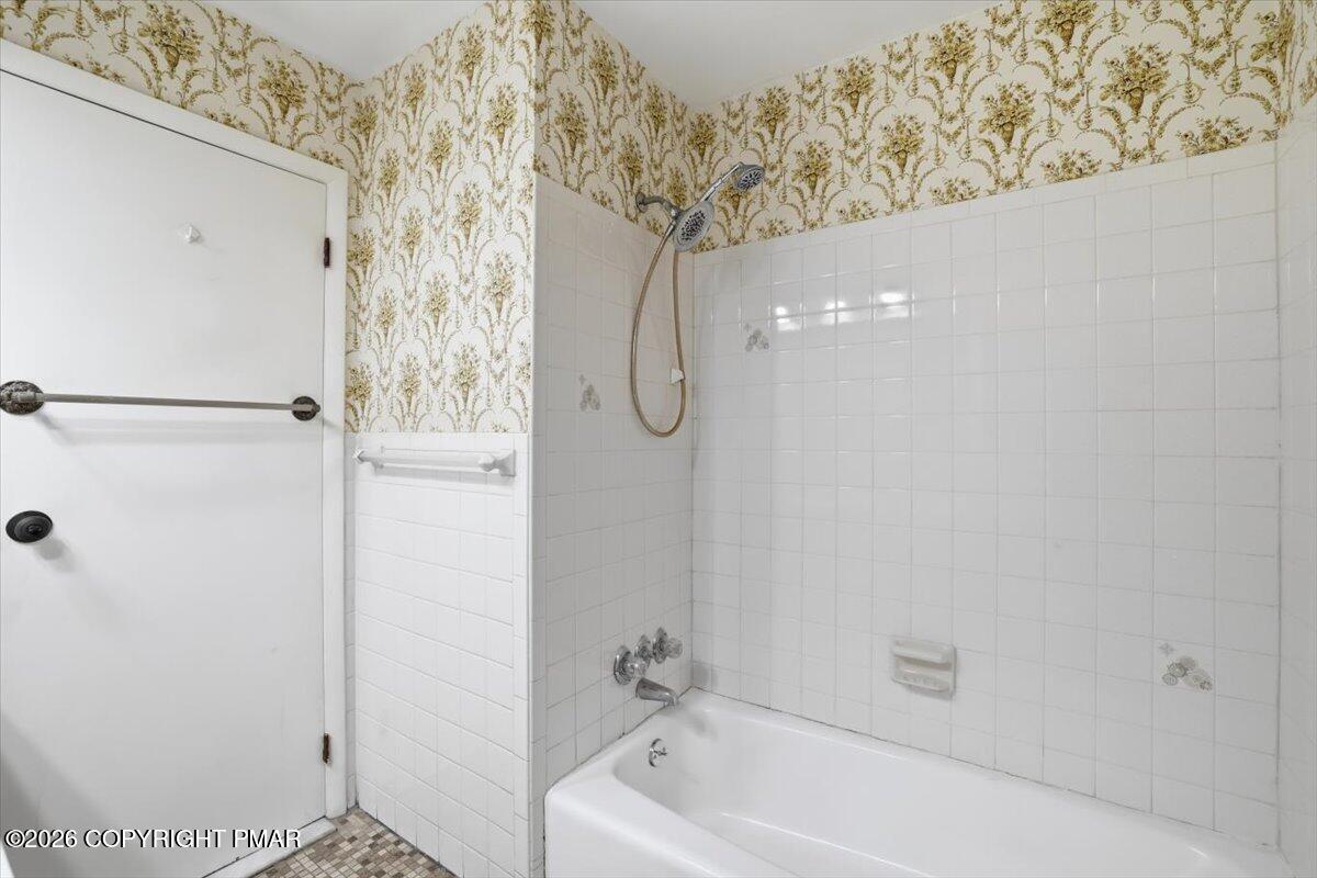 423 T R 620 Cresco, PA 18326 - Photo 21 of 37 a bathroom with a bathtub and shower