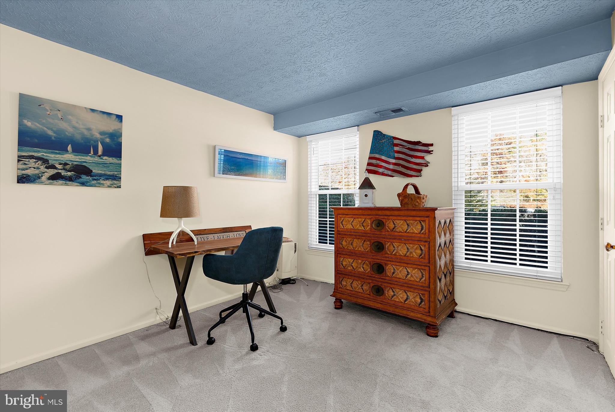 679 Deering Road, Unit 4D Pasadena, MD 21122 - Photo 14 of 28 a bedroom with furniture and a window