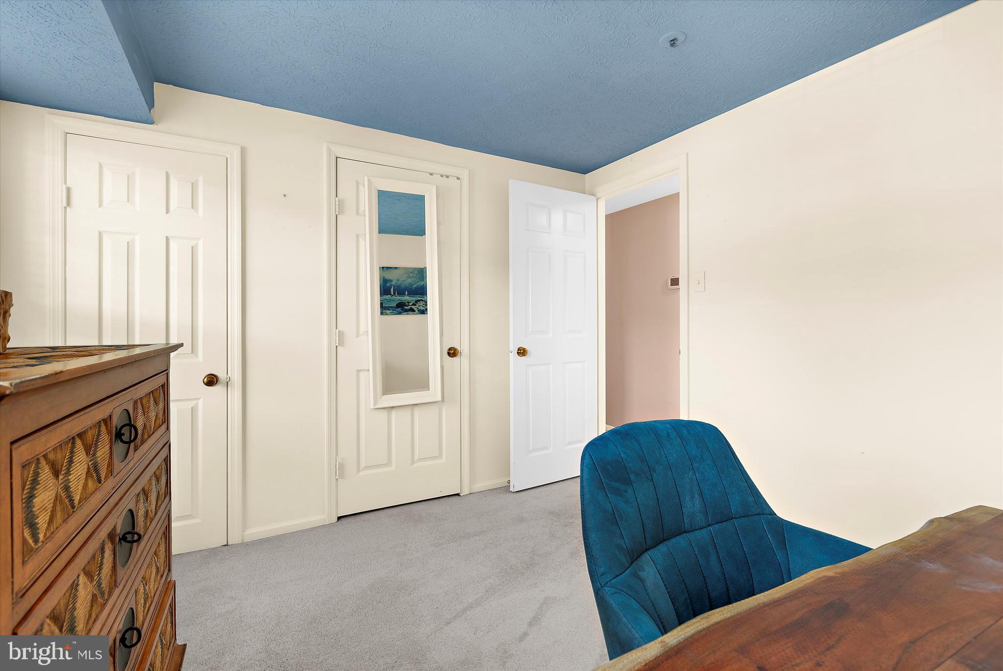 679 Deering Road, Unit 4D Pasadena, MD 21122 - Photo 16 of 28 a view of livingroom with furniture and staircase