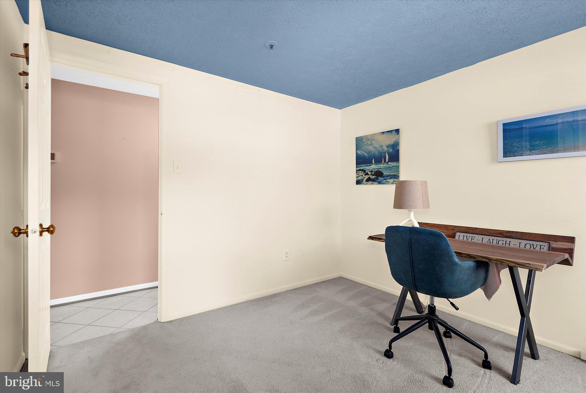 679 Deering Road, Unit 4D Pasadena, MD 21122 - Photo 17 of 28 a view of workspace filled with furniture