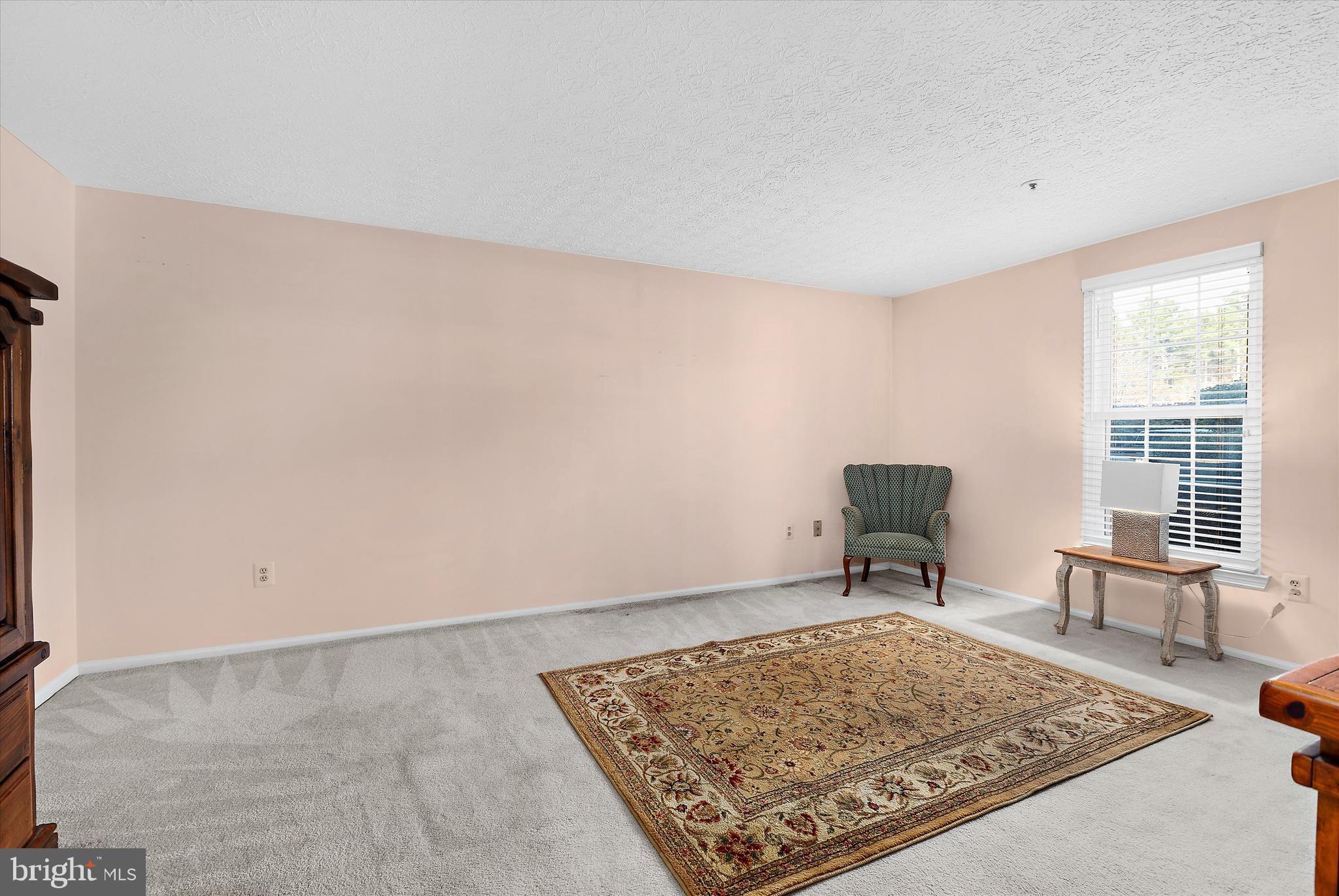 679 Deering Road, Unit 4D Pasadena, MD 21122 - Photo 21 of 28 a view of workspace with wooden floor and window