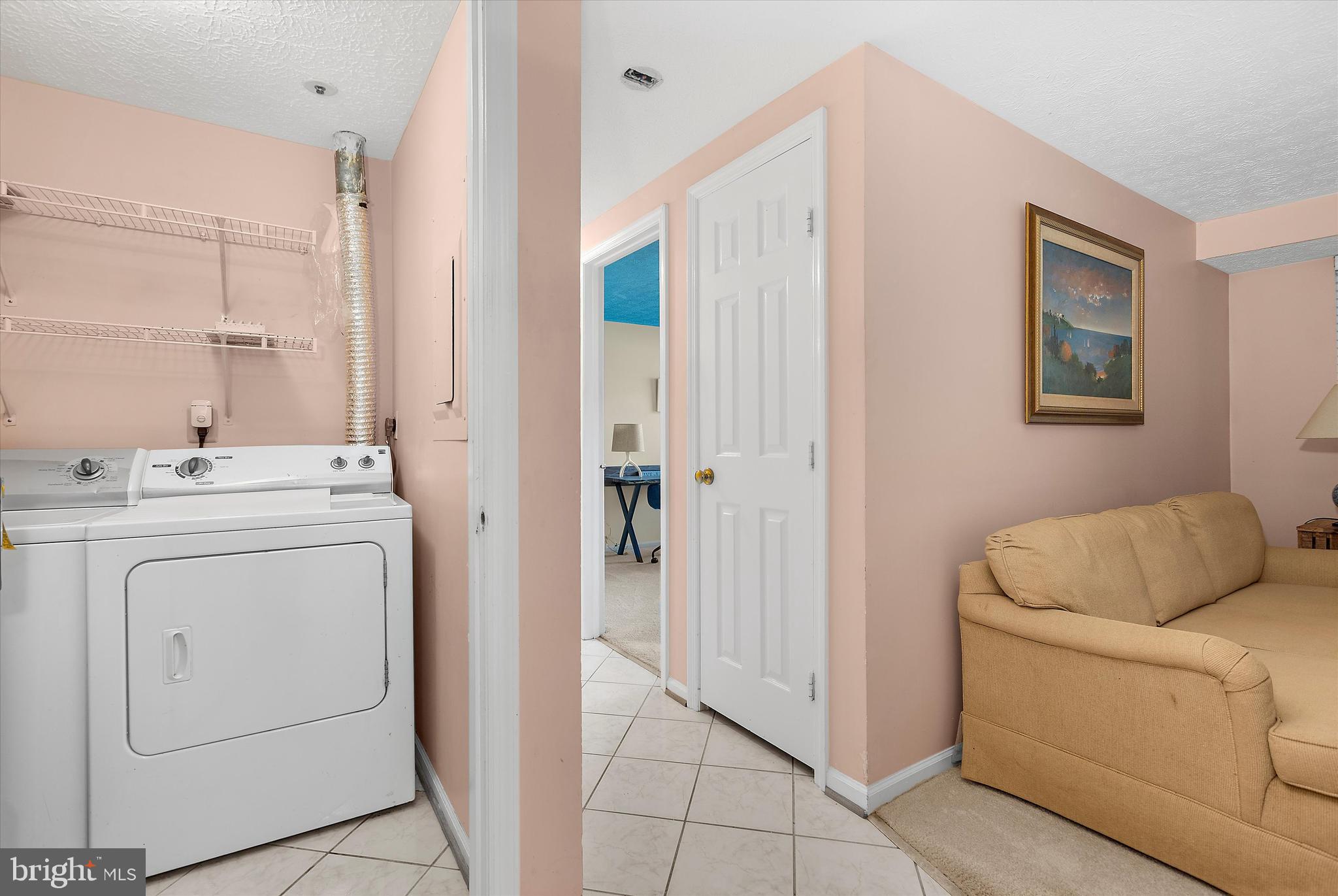 679 Deering Road, Unit 4D Pasadena, MD 21122 - Photo 23 of 28 a utility room with dryer and washer
