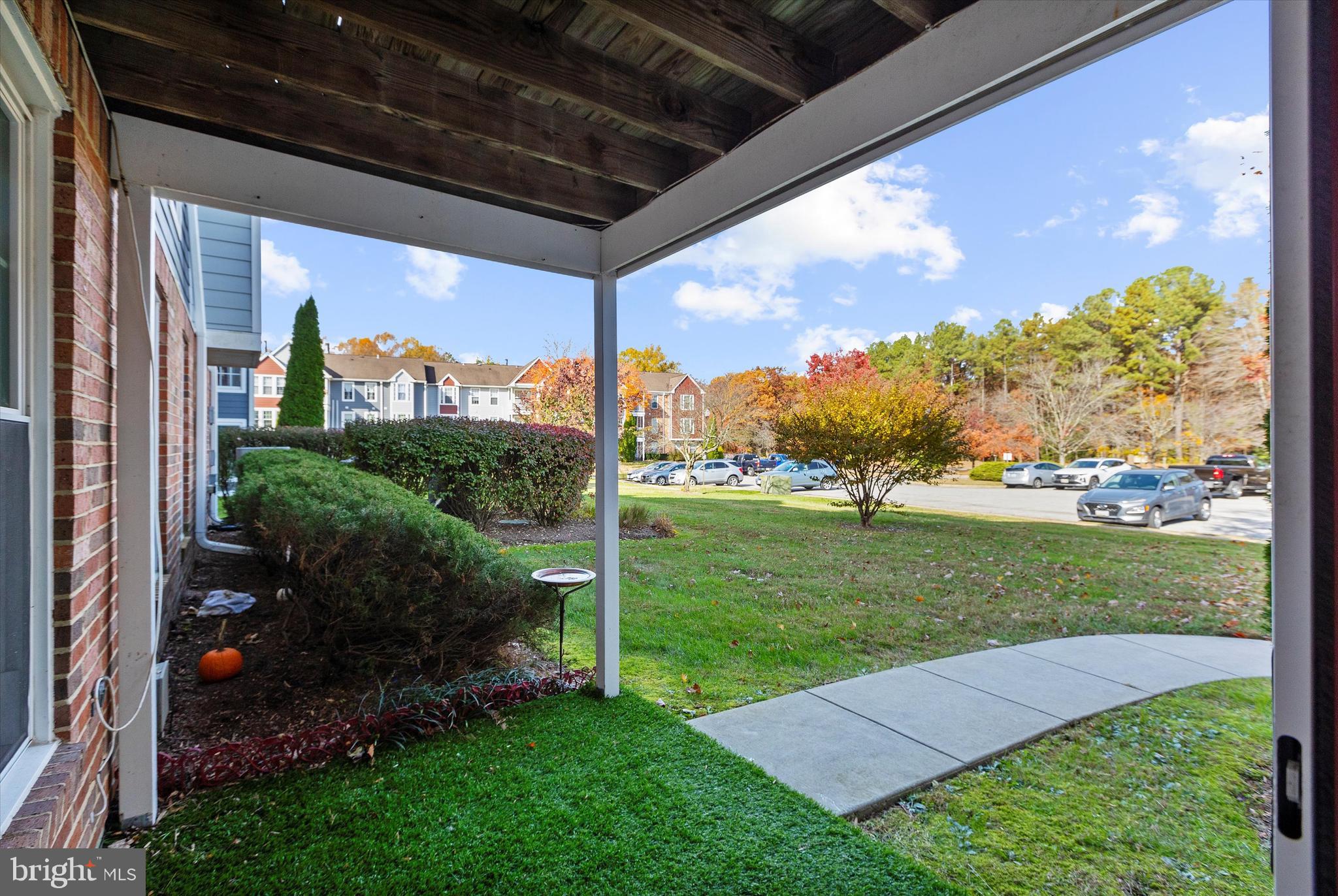 679 Deering Road, Unit 4D Pasadena, MD 21122 - Photo 24 of 28 a view of a porch with a big yard