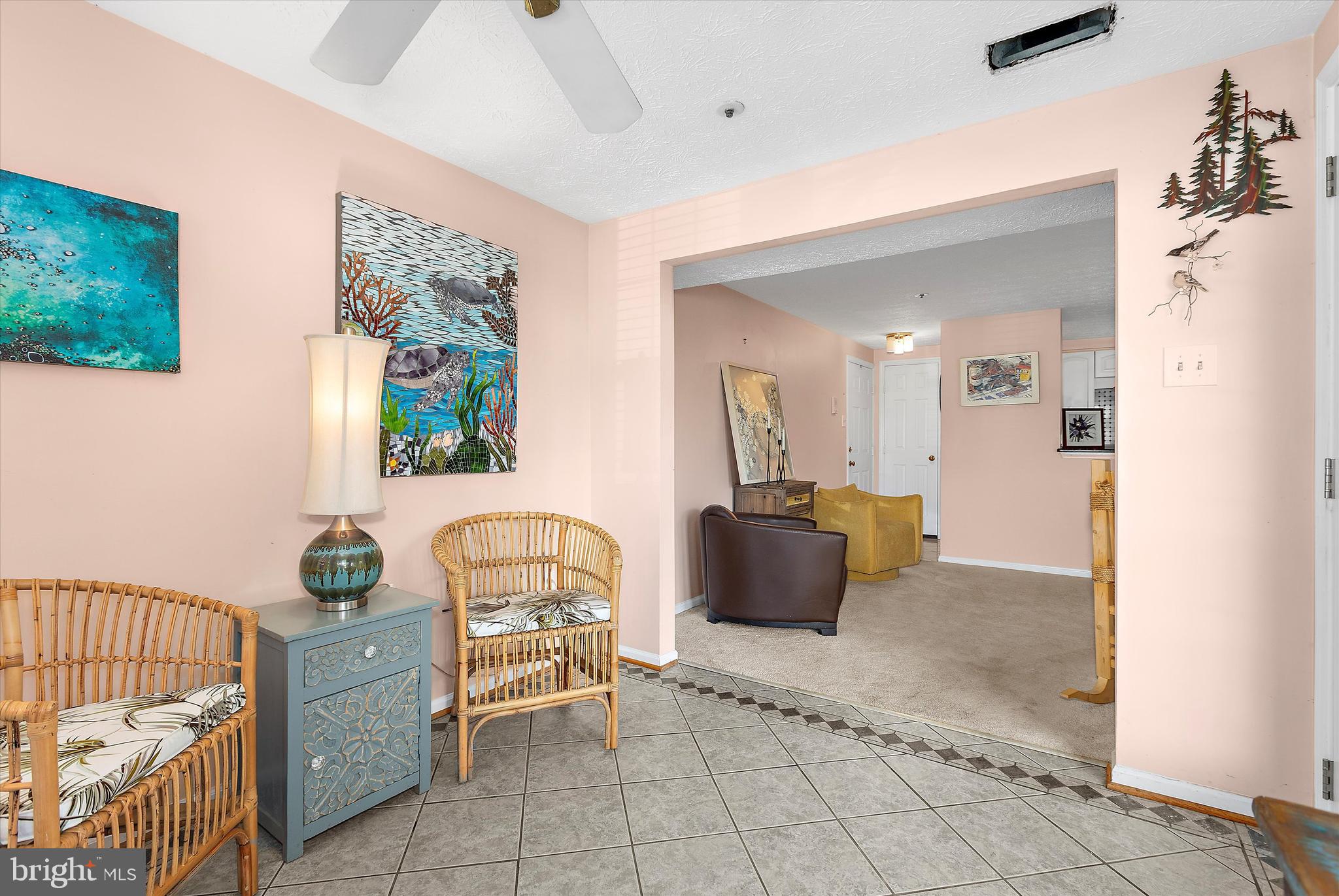 679 Deering Road, Unit 4D Pasadena, MD 21122 - Photo 8 of 28 a living room with furniture and a wooden floor