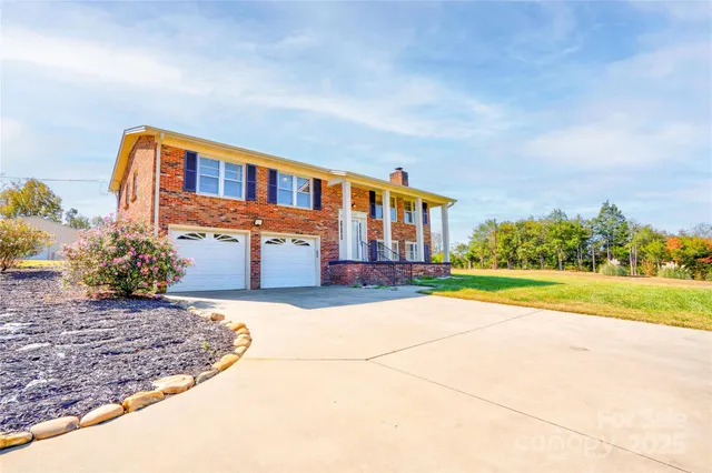 a house view with a garden space