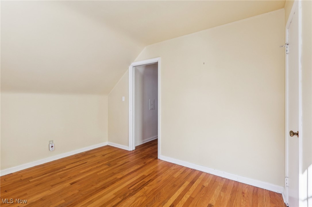 4476 College Road South Euclid, OH 44121 - Photo 21 of 42 Bonus room with hardwood / wood-style flooring and vaulted ceiling