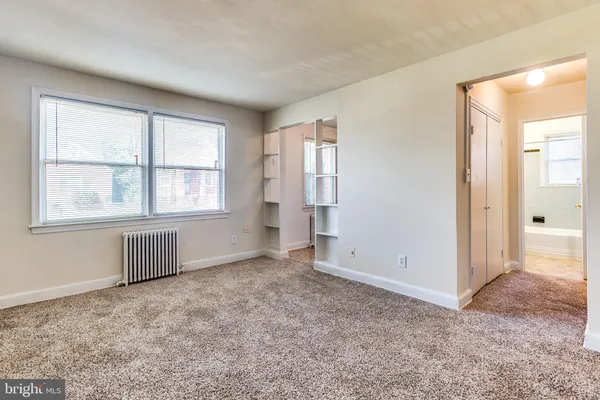 an empty room with windows