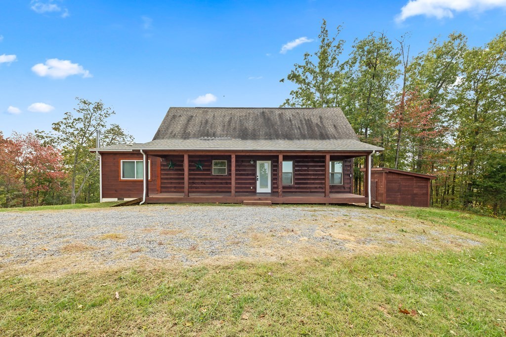 604 Hickory Hilham, TN 38568 - Photo 4 of 38 a front view of a house with a garden