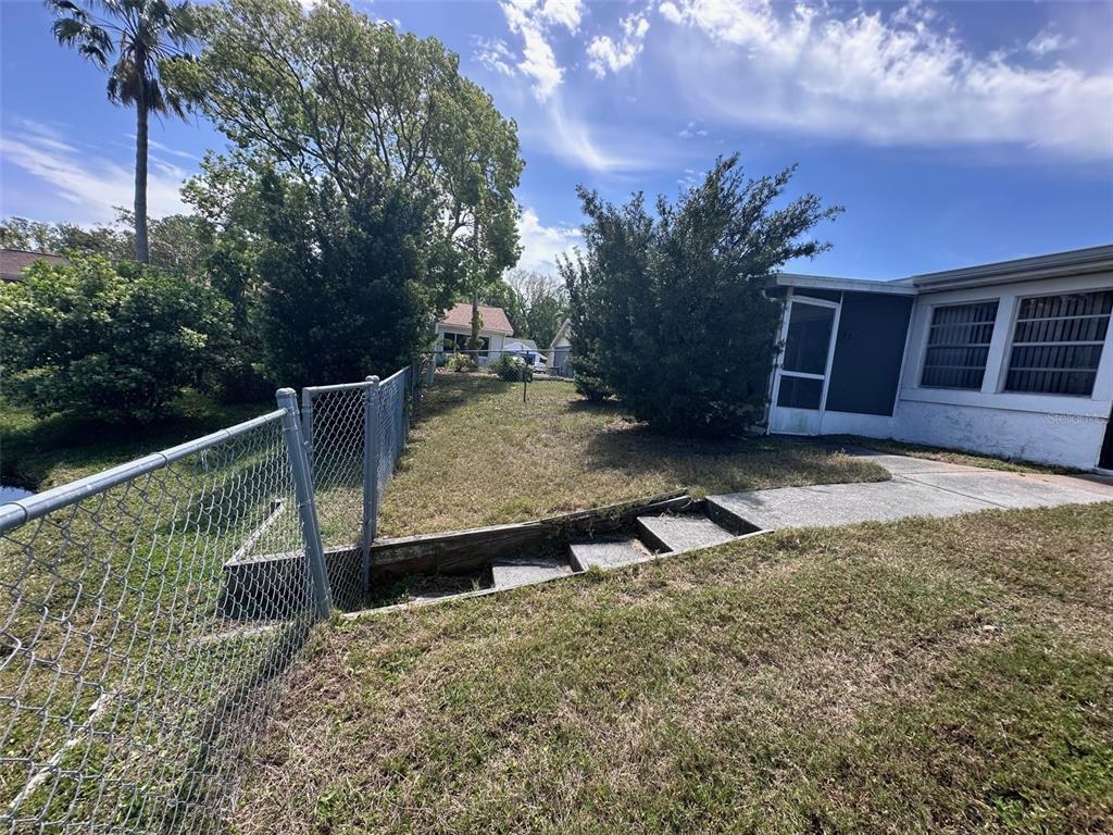 3542 Delta Place Holiday, FL 34691 - Photo 12 of 28 a view of a backyard with sitting area