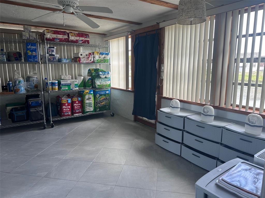 3542 Delta Place Holiday, FL 34691 - Photo 20 of 28 a living room with furniture and a window
