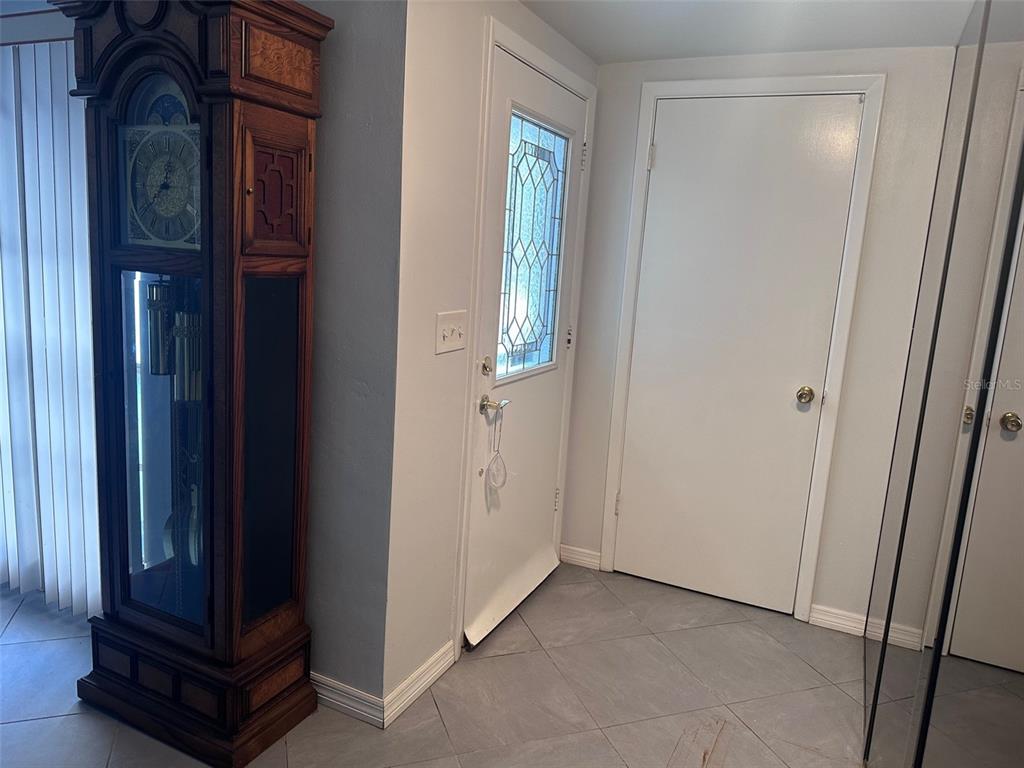 3542 Delta Place Holiday, FL 34691 - Photo 25 of 28 a view of an entryway with hallway