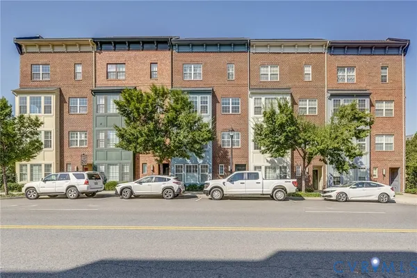 a view of a hallway with entryway door