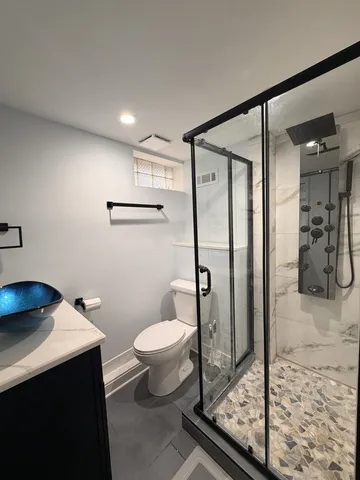 a hallway with a view of living room