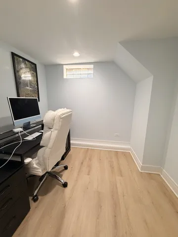 a bed room with a bed and a window