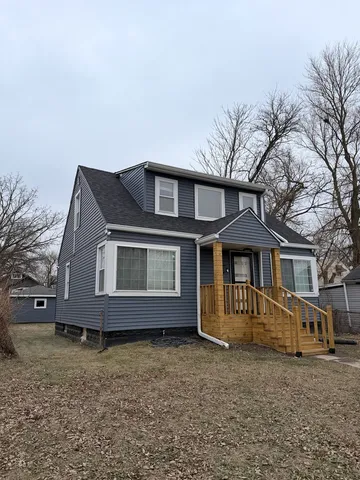a front view of a house with windows