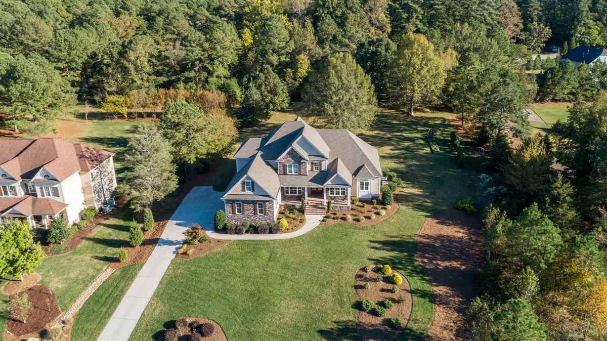 12904 Grovehurst Drive Raleigh, NC 27613 - Photo 2 of 30 Where in Raleigh can you catch an Autumn view of Red Mountain, but only be minutes to I-540, shopping, restaurants, RTP and RDU... right from the front view of this custom built beauty! Parker Falls also has a private salt water pool /clubhouse Exterior Front