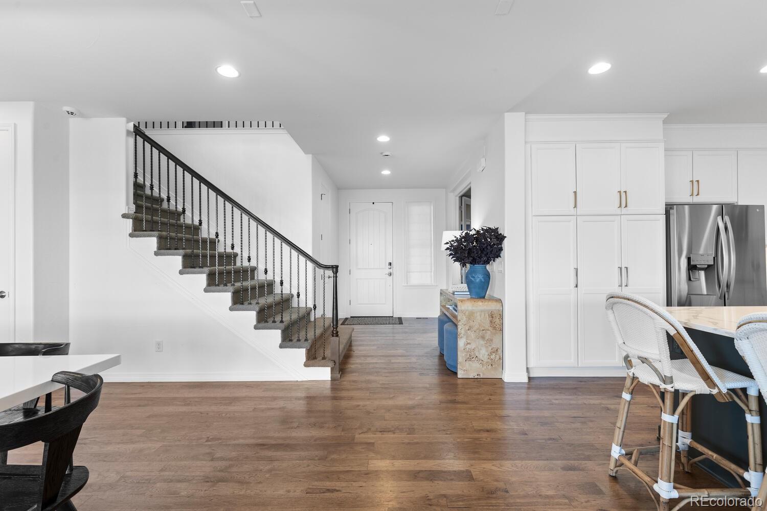 10699 Timberdash Avenue Highlands Ranch, CO 80126 - Photo 21 of 50 a view of entryway and kitchen