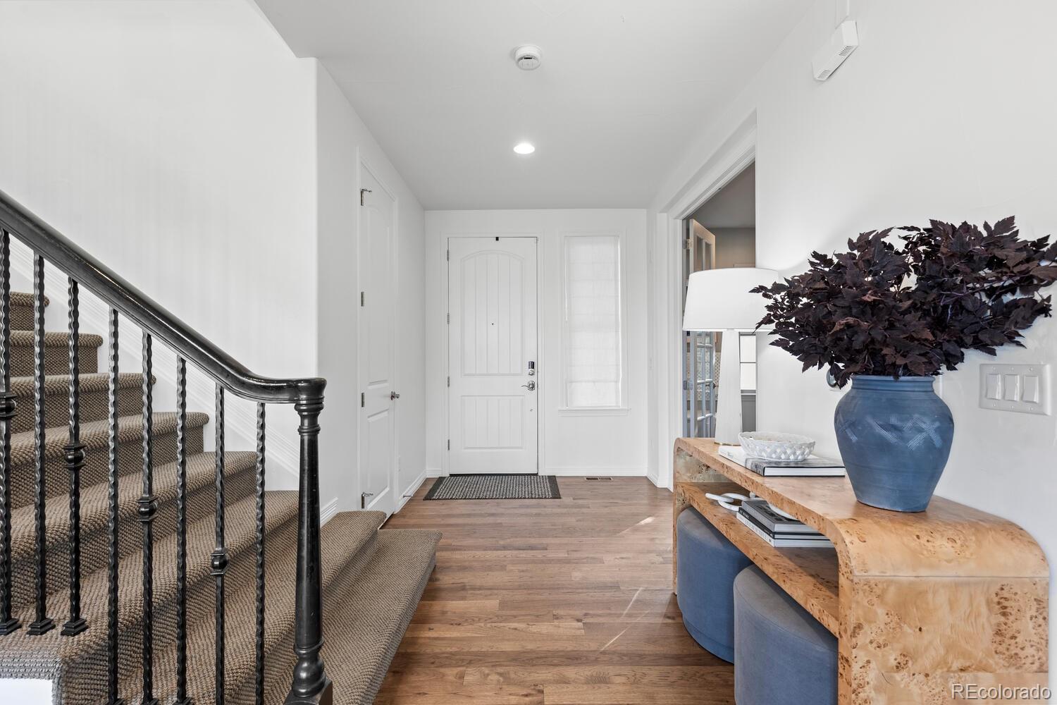 10699 Timberdash Avenue Highlands Ranch, CO 80126 - Photo 22 of 50 a view of entryway and hall