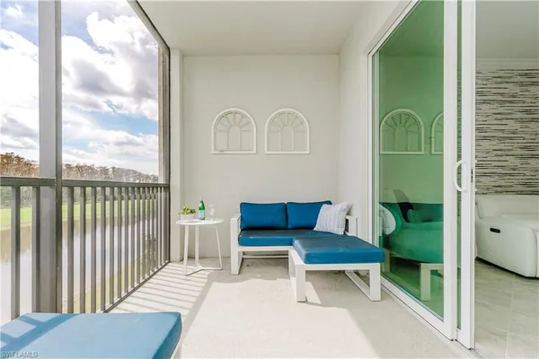 a living room with a couch and a table