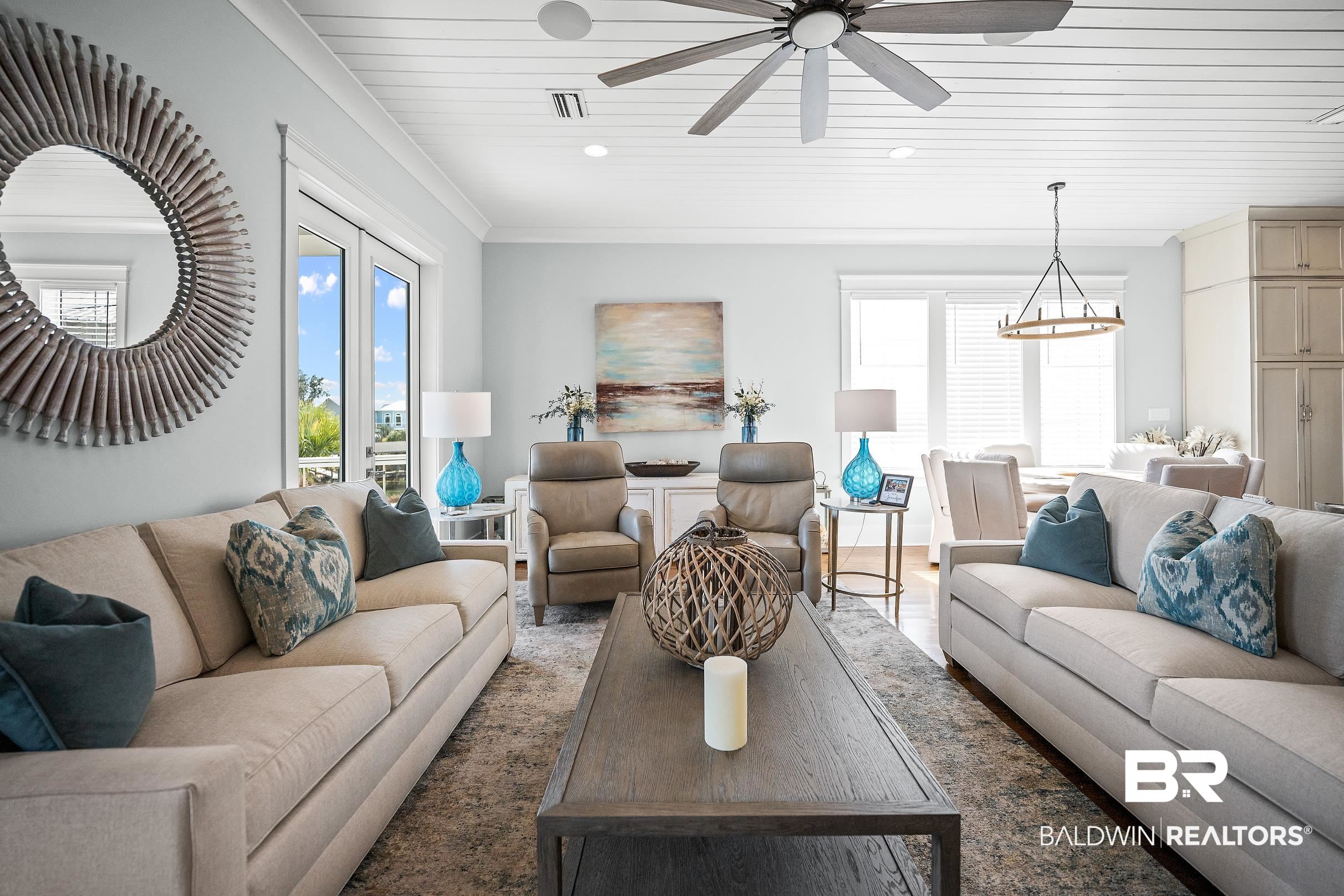 33186 Marlin Key Drive Orange Beach, AL 36561 - Photo 40 of 87 Living room with a ceiling fan, wood finished floors, and wooden ceiling