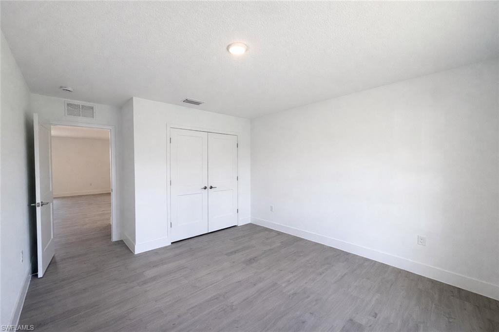 2709 22nd Street Southwest Lehigh Acres, FL 33976 - Photo 14 of 18 a view of an empty room